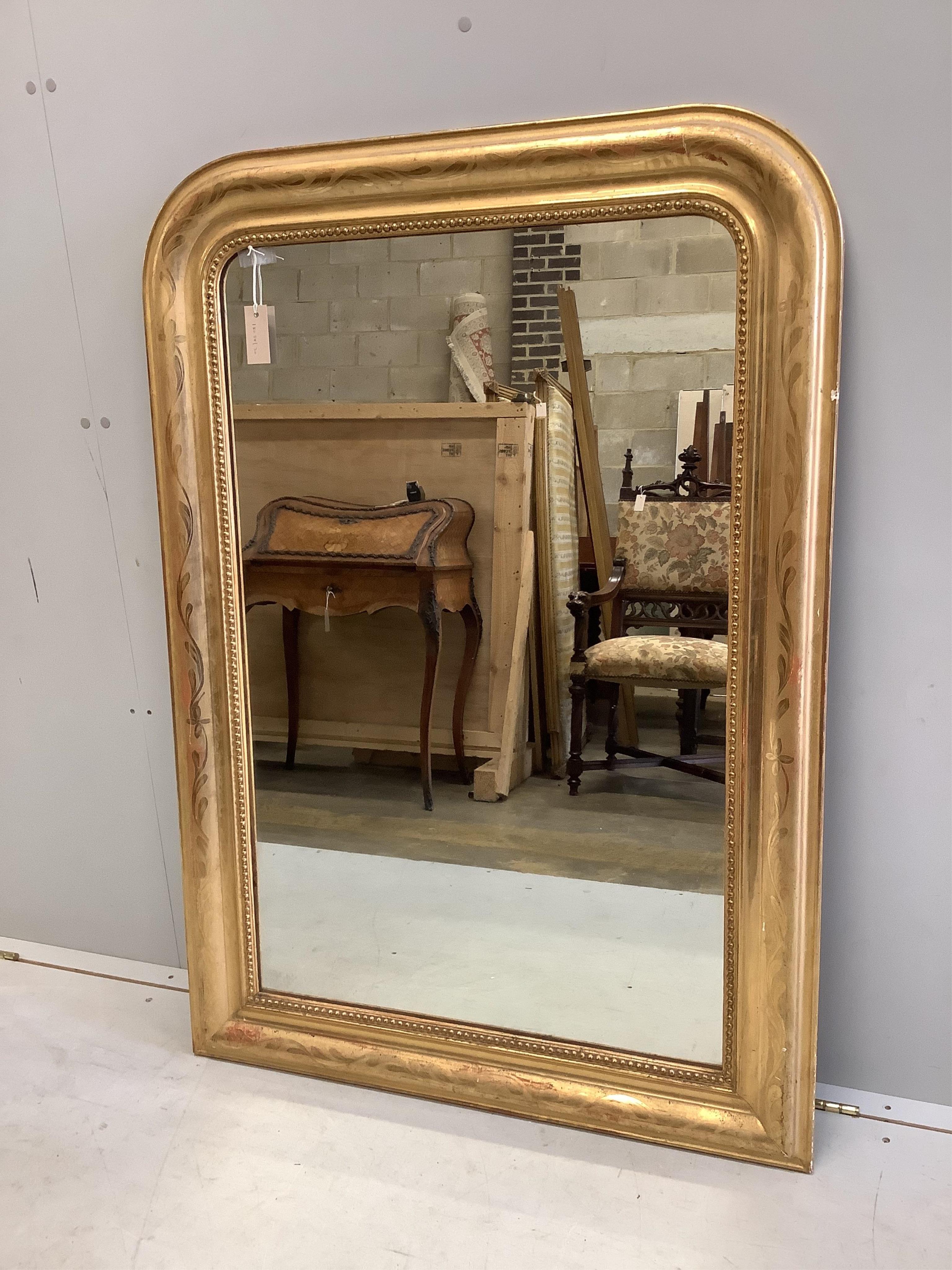 A 19th century French overmantel mirror, width 86cm, height 123cm. Condition - fair